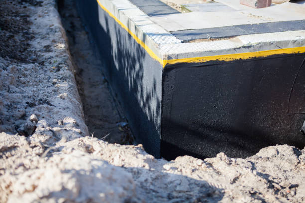 Professional Exterior Waterproofing technician working in Washington, NJ
